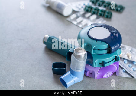 Pills and inhalers for asthma, bronchitis, lungs diseases, first aid Stock Photo