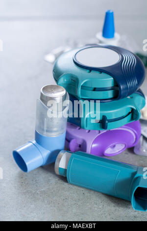 Pills and inhalers for asthma, bronchitis, lungs diseases, first aid Stock Photo