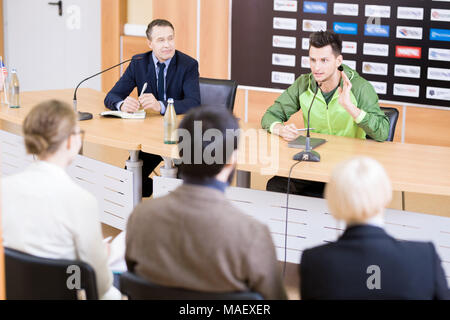 Giving Explanations to Journalists Stock Photo
