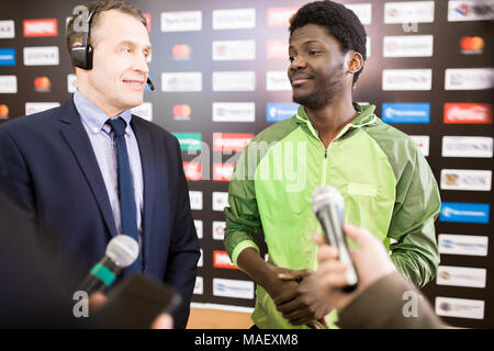 African American Footballer Giving Interview Stock Photo