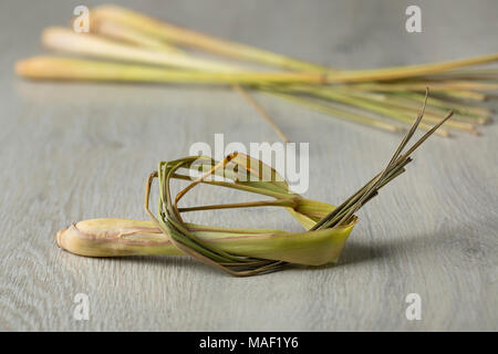 Fresh lemon grass in a knot ready to cook Stock Photo