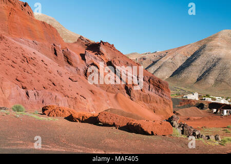 View from the Caldera de Masian in Lanzarote, Spain to the village of Femes. Stock Photo