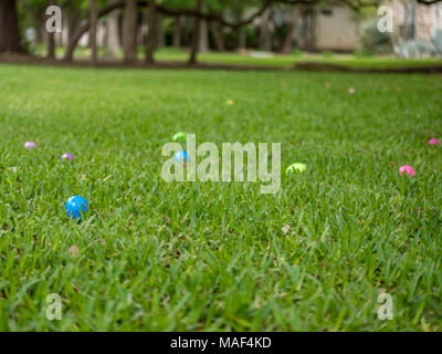 Colorful Easter Plastic Egg On Front Yard Grass Stock Photo