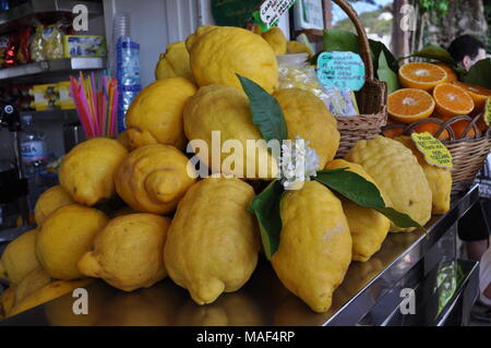 Pile of huge lemons on lemonade stand, capri island, italy Stock Photo