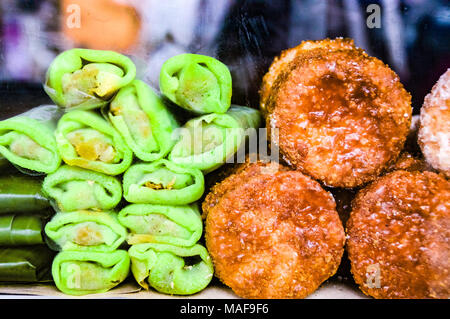 Delicious Indonesian sweet snacks sold on little stalls along the streets of Medan City in Indonesia Stock Photo