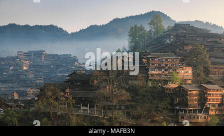 Xijiang Qianhu Miao Village in Guizhou, China at sunrise Stock Photo