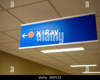 Closeup view X-Ray directional sign in British hospital. Stock Photo