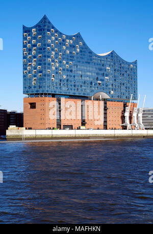 View from the top deck of a ferry of the Elbphilharmonie concert hall on a peninsula jutting out into the river Elbe, in Hamburg Germany Stock Photo