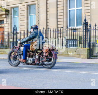 Biker riding an Indian motorcycle in the annual Easter Egg Run from Glasgow Green to The Royal Hospital For Children to raise funds for Charity Stock Photo