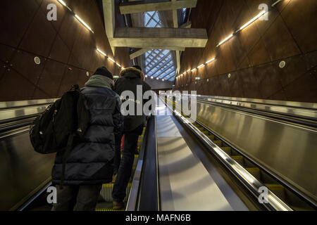 BUDAPEST, HUNGARY - DECEMBER 18, 2016: People going up a metro station of Budapest on an escalator on line 4, the most modern one of Budapest public t Stock Photo
