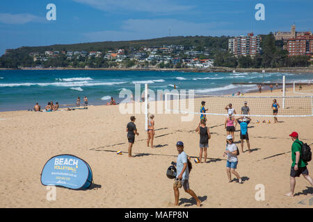 Beach volleyball being played on Manly beach in Sydney,Australia Stock Photo