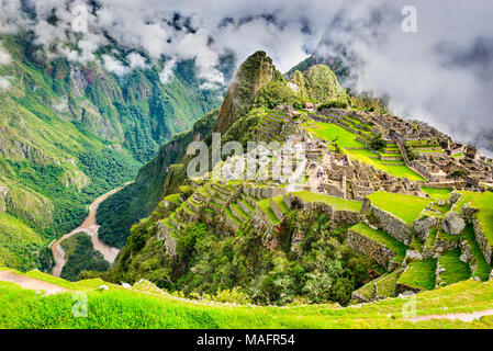 Machu Picchu in Peru - Ruins of Inca Empire city and Huaynapicchu Mountain in Sacred Valley, Cusco, South America.