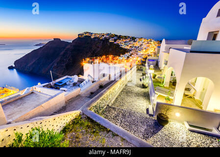 Santorini, Greece. Firostefani twilight, old village in Thira island, Cyclades at Aegean Sea. Stock Photo