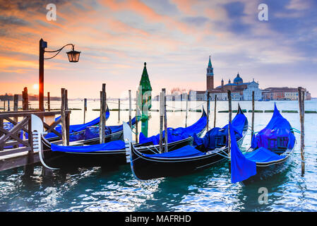 Venice, Italy. Sunrise with Gondolas on Grand Canal, Piazza San Marco, Adriatic Sea. Stock Photo