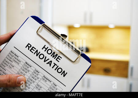 Clipboard with home renovation cost or estimate. Stock Photo