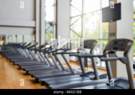 Abstract blurred photo of fitness gym background, sport concept Stock Photo