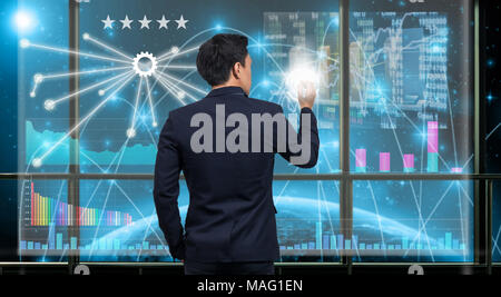 Back side of Businessman drawing the Technical information over the virtual screen on the Part of earth network line background out off window,Element Stock Photo