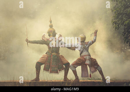 Khon, pantomime performances action of Thailand, a kind of Thai drama, Hanuman Monkey fighting with Tos-sa-kan Giant at Ayutthaya temple, performing a Stock Photo