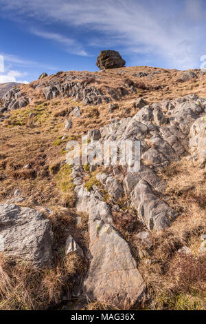Boulder balanced on top of a hill, Snowdonia, North Wales Stock Photo