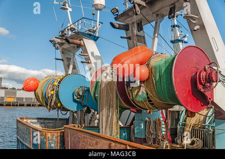 fishing boat net winch on port Stock Photo - Alamy