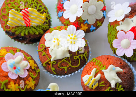 Portland, UK. 1st April 2018 - Student, Sophie (22), has fun baking tasty Easter treats on cold, rainy Sunday on the Isle of Portland in Dorset Stock Photo