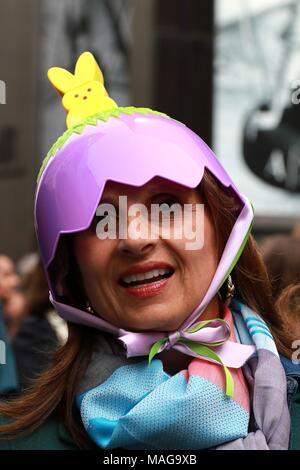 New York, USA. 01st Apr, 2018. New York, NY US. 1st. Apr, 2018. The annual holiday parade attracted a large crowd of all ages and from around the world featuring revelers dressed in colorful outfits, bunny ears and - the always anticipated - creative hats and bonnets. The Easter parade and bonnet festival was made famous by Irving Berlin's song, 'Easter Parade,' in 1933. The song was later featured in the film 'Easter Parade' starring Judy Garland and Fred Astaire. © 2018 Credit: G. Ronald Lopez/Alamy Live News Stock Photo