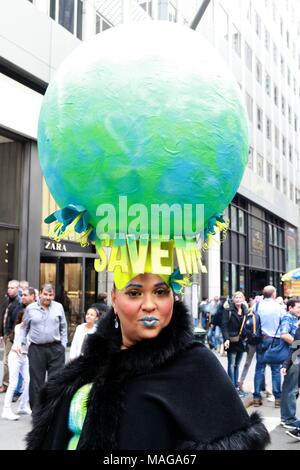 New York City, New York, USA. 1st Apr, 2018. The annual holiday parade attracted a large crowd of all ages and from around the world featuring revelers dressed in colorful outfits, bunny ears and ''” the always anticipated ''” creative hats and bonnets. The Easter parade and bonnet festival was made famous by Irving Berlin's song, ''Easter Parade, '' in 1933. The song was later featured in the film ''Easter Parade'' starring Judy Garland and Fred Astaire. Credit: G. Ronald Lopez/ZUMA Wire/Alamy Live News Stock Photo