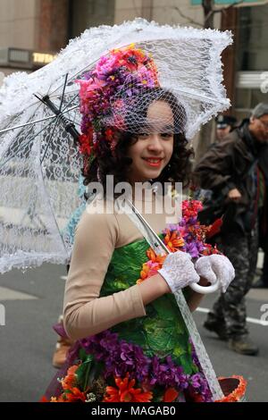 New York City, New York, USA. 1st Apr, 2018. The annual holiday parade attracted a large crowd of all ages and from around the world featuring revelers dressed in colorful outfits, bunny ears and ''” the always anticipated ''” creative hats and bonnets. The Easter parade and bonnet festival was made famous by Irving Berlin's song, ''Easter Parade, '' in 1933. The song was later featured in the film ''Easter Parade'' starring Judy Garland and Fred Astaire. Credit: G. Ronald Lopez/ZUMA Wire/Alamy Live News Stock Photo