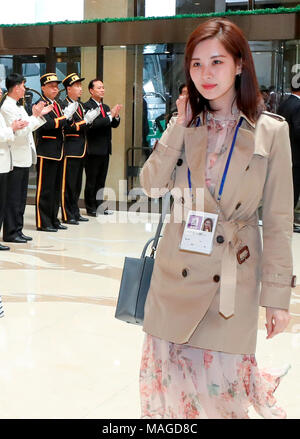 Seohyun (Girls' Generation), Mar 31, 2018 : South Korean singer Seohyun (R), a member of girl group Girls' Generation, arrives at Koryo hotel in Pyongyang, North Korea. South Korean taekwondo athletes and K-Pop musicians such as Cho Yong-pil, Lee Sun-hee, Choi Jin-hee, Yoon Do-hyun (YB), Baek Ji-young, Red Velvet, Jungin, Seohyun (Girls' Generation), Ali, Kang San-eh and Kim Kwang-min will perform at the East Pyongyang Grand Theater on Sunday and will perform in a joint concert with North Korean artists on Tuesday at the Ryugyong Jong Ju Yong Gymnasium in Pyongyang in a cross-border cultural e Stock Photo