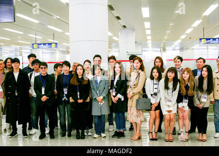 Red Velvet, Mar 31, 2018 : Four members of girl group Red Velvet (R, front row) and other South Korean musicians pose upon their arrival at Sunan airport in Pyongyang, North Korea. South Korean taekwondo athletes and K-Pop musicians such as Cho Yong-pil, Lee Sun-hee, Choi Jin-hee, Yoon Do-hyun (YB), Baek Ji-young, Red Velvet, Jungin, Seohyun (Girls' Generation), Ali, Kang San-eh and Kim Kwang-min will perform at the East Pyongyang Grand Theater on Sunday and will perform in a joint concert with North Korean artists on Tuesday at the Ryugyong Jong Ju Yong Gymnasium in Pyongyang in a cross-borde Stock Photo