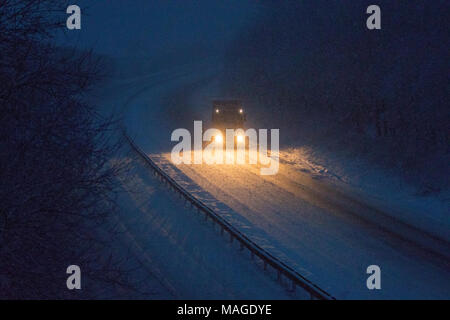 Flintshire, Wales, UK 2nd April 2018, UK Weather: A washout Easter Bank Holiday ends with a Met Officer weather warning for rain and snow for Bank Holiday Monday as Flintshire gets covered in snow. © DGDImages/Alamy Live News Stock Photo