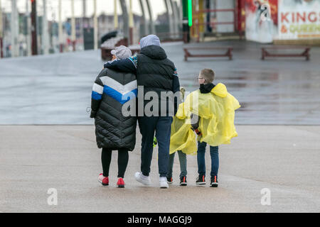 Blackpool. 2nd April 2018. UK Weather.  Dreadful Bank Holiday Weather, Terrible windy and rainy weather conditions batter the north west seafront at the seaside coastal resort town of Blackpool in Lancashire.  Closed ice cream kiosks and deserted beaches due to the severe weather as tourists head home early over the Easter bank holiday weekend. Credit: Cernan Elias/Alamy Live News Stock Photo