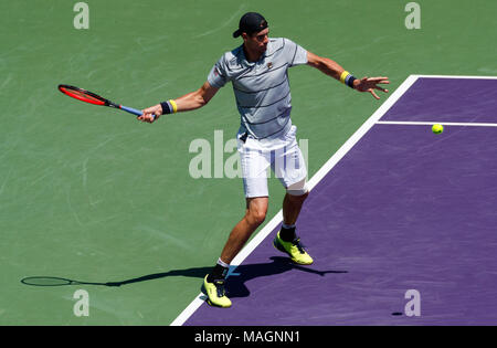 April 01, 2018: John Isner of the United States returns to Alexander Zverev of Germany in the men's single championship final of the 2018 Miami Open presented by Itau professional tennis tournament, played at the Crandon Park Tennis Center in Key Biscayne, Florida, USA. Isner won 6-7(4), 6-4, 6-4. Mario Houben/CSM. Stock Photo