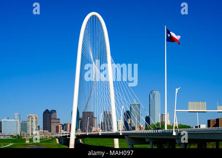 Dallas, Texas Skyline with Margaret Hunt Hill Bridge in the foreground. Clear blue sky background. Stock Photo