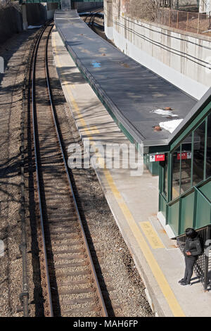 A view from above of the Metro North railroad station in Pleasantville, New York on a quiet weekday winter afternoon. Stock Photo