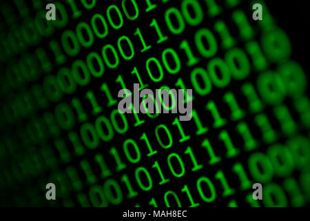 Numerical continuous code in green color, abstract web data in binary code. Stock Photo