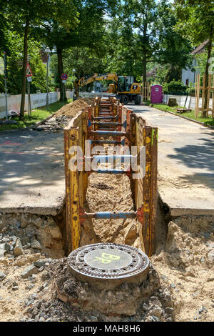 Details of road works in a green part of the city of Berlin, Germany. Stock Photo