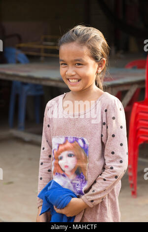 Cambodia children - a happy smiling 10 year old girl child in Kampong Thom, Cambodia, South East Asia Stock Photo