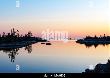 Islands silhouetted in a Georgian Bay sunset Stock Photo