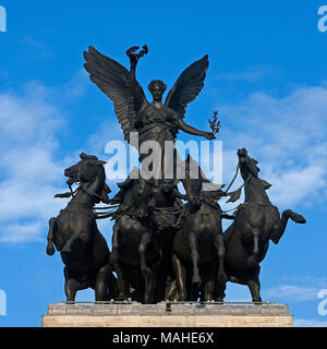 Quadriga by Adrian Jones (1845 - 1938)  Quadriga was an ancient Roman chariot drawn by four horses and used in various races, most famously illustrate Stock Photo