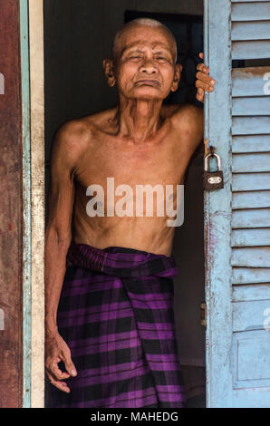 An old man of the Cham ethnic group in Chau Doc, Vietnam Stock Photo