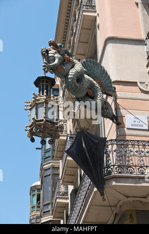 A Dragon lamp holder outside the House of Umbrellas (Casa Bruno Cadres), La Rambla of Barcelona, Spain Stock Photo