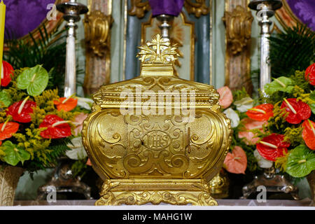 A symbol of Catholic devotion, exposed in church on the altar during adoration of the Blessed Sacrament Stock Photo