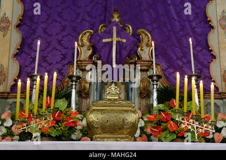 A symbol of Catholic devotion, exposed in church on the altar during adoration of the Blessed Sacrament Stock Photo