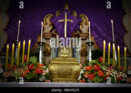 A symbol of Catholic devotion, exposed in church on the altar during adoration of the Blessed Sacrament Stock Photo