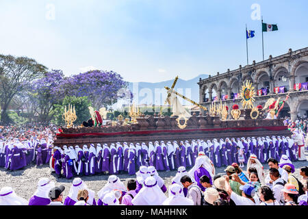 Antigua, Guatemala -  March 25, 2018: Palm Sunday procession in front of City Hall & park in colonial town with famous Holy Week celebrations Stock Photo