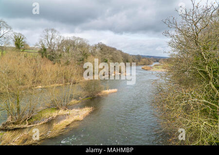 View along the river Wye from the B4351 river bridge Hay-on-Wye Herefordshire UK. March 2018 Stock Photo