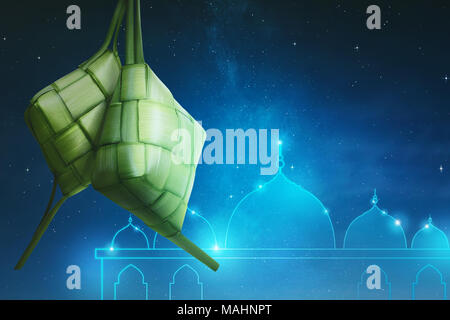 Rice dumpling (ketupat) with unique pattern over night background Stock Photo