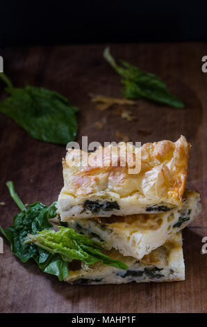 Spinach pie with cheese and eggs Stock Photo