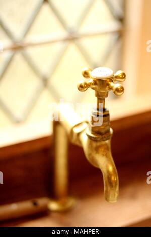 Vintage retro kitchen taps -  with background blur Stock Photo